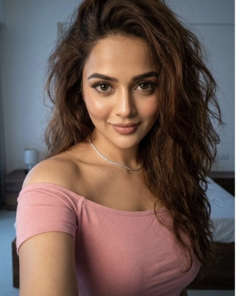 Tanvi in a pink off-shoulder top